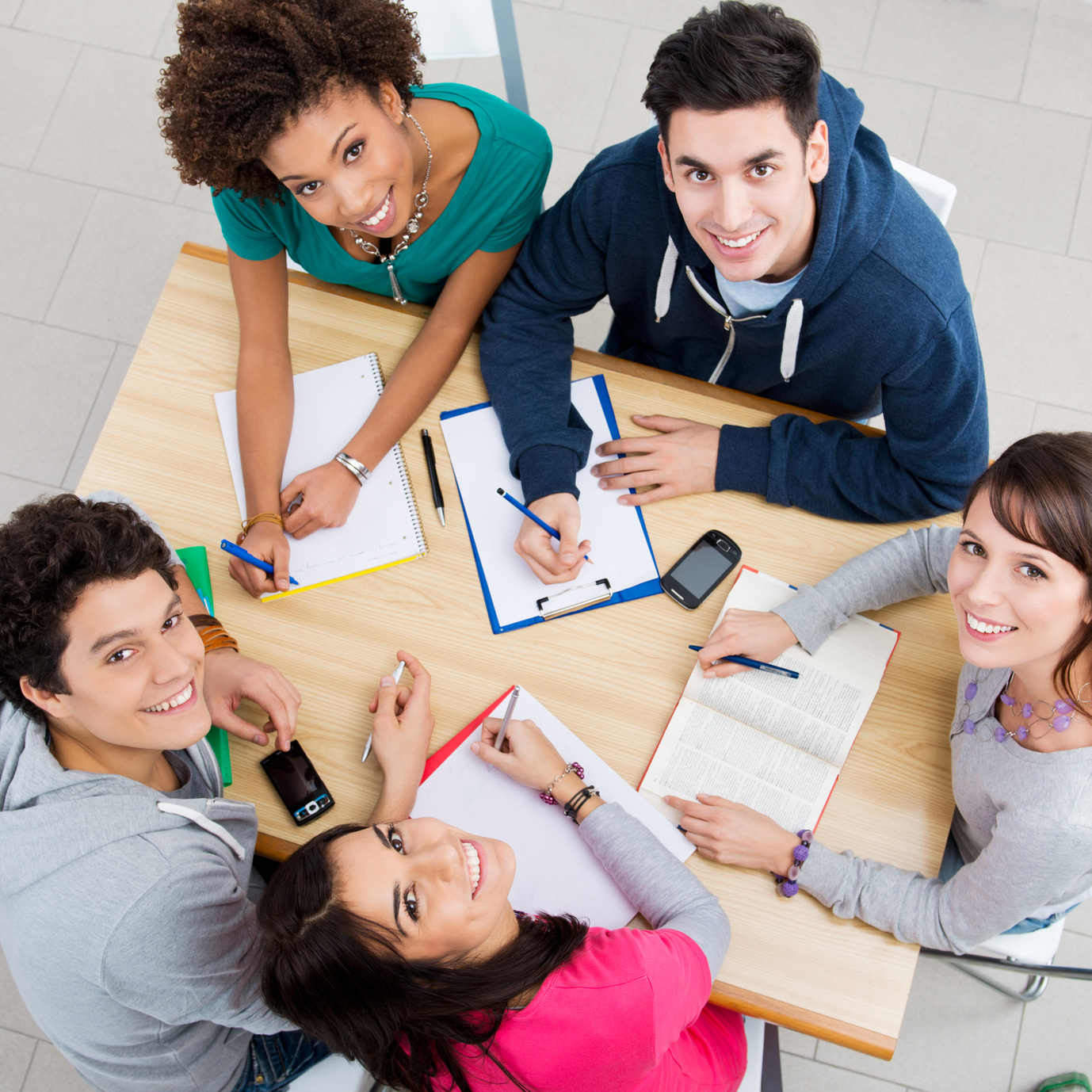 student, studying, library, group, girl, man, school, college, university, together, boy, study, smiling, homework, multi, ethnic, friend, knowledge, pen, book, table, desk, afro, black, african, latin, hispanic, casual, sitting, holding, education, people, person, indoor, classroom, male, female, woman, young, beautiful, learning, notes, happy, looking, high, view, look, teenager, teen ©francescoridolfi.com