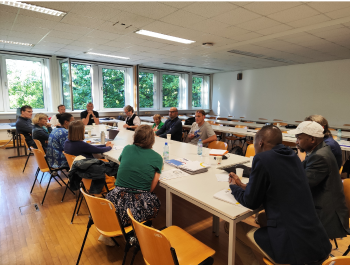 Conference, people sitting together ©Angelika Heiling