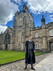 Tom in from of University of Aberdeen Chapel