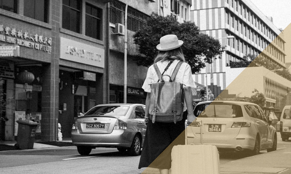 Picture of person with suitcase