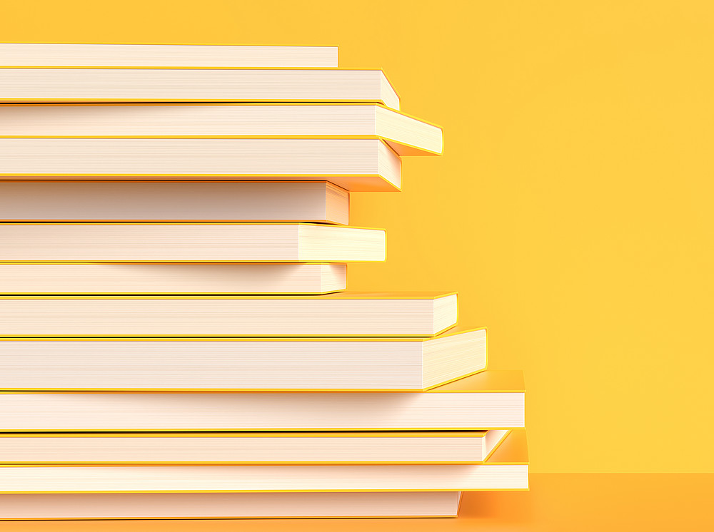 yellow books isolated on yellow background with copy space ©By Salih; stock.adobe.com