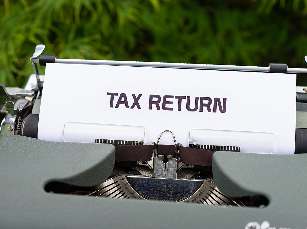 Typewriter with tax return as text 