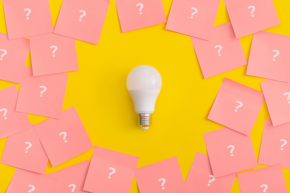 Light bulb without light on yellow paper with cards with question marks ©LunaKate - stock.adobe.com