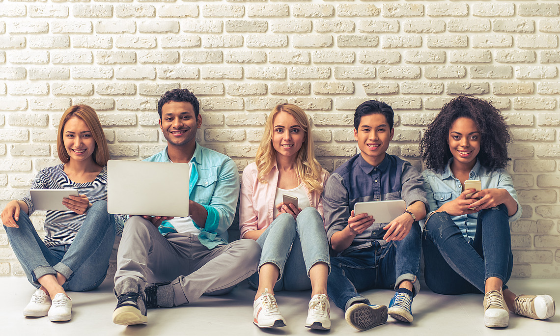 students sitting on the floor