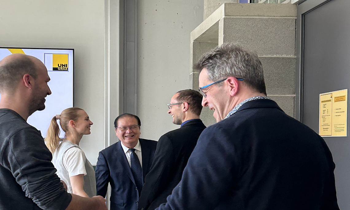 Members of the Department of Global Governance, Prof. Franz Winter, and Prof. Ouyang Kang.