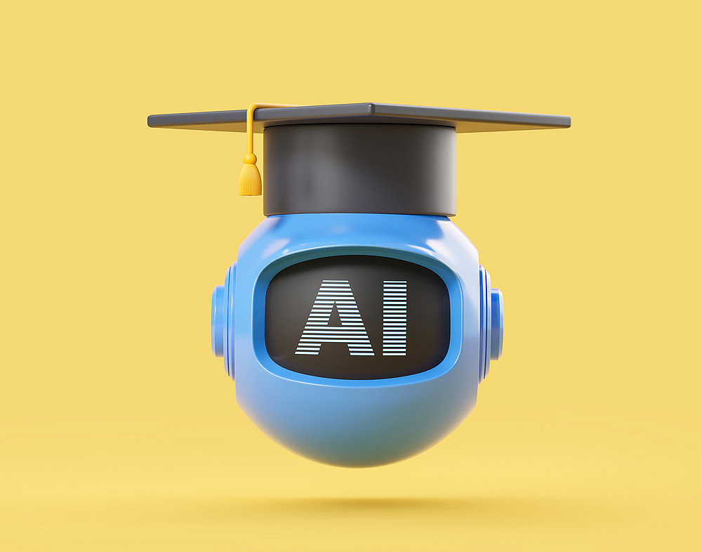 blue ball robot has AI on display and is wearing a motarboard in front of a yellow background 