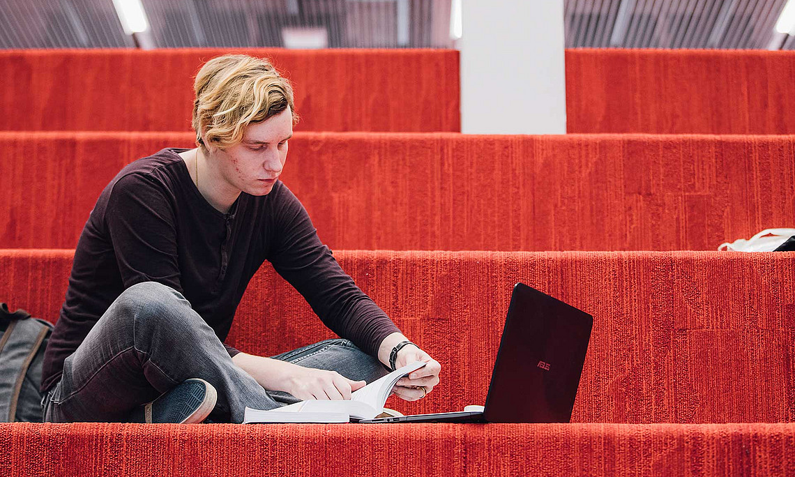 Student with a notebook