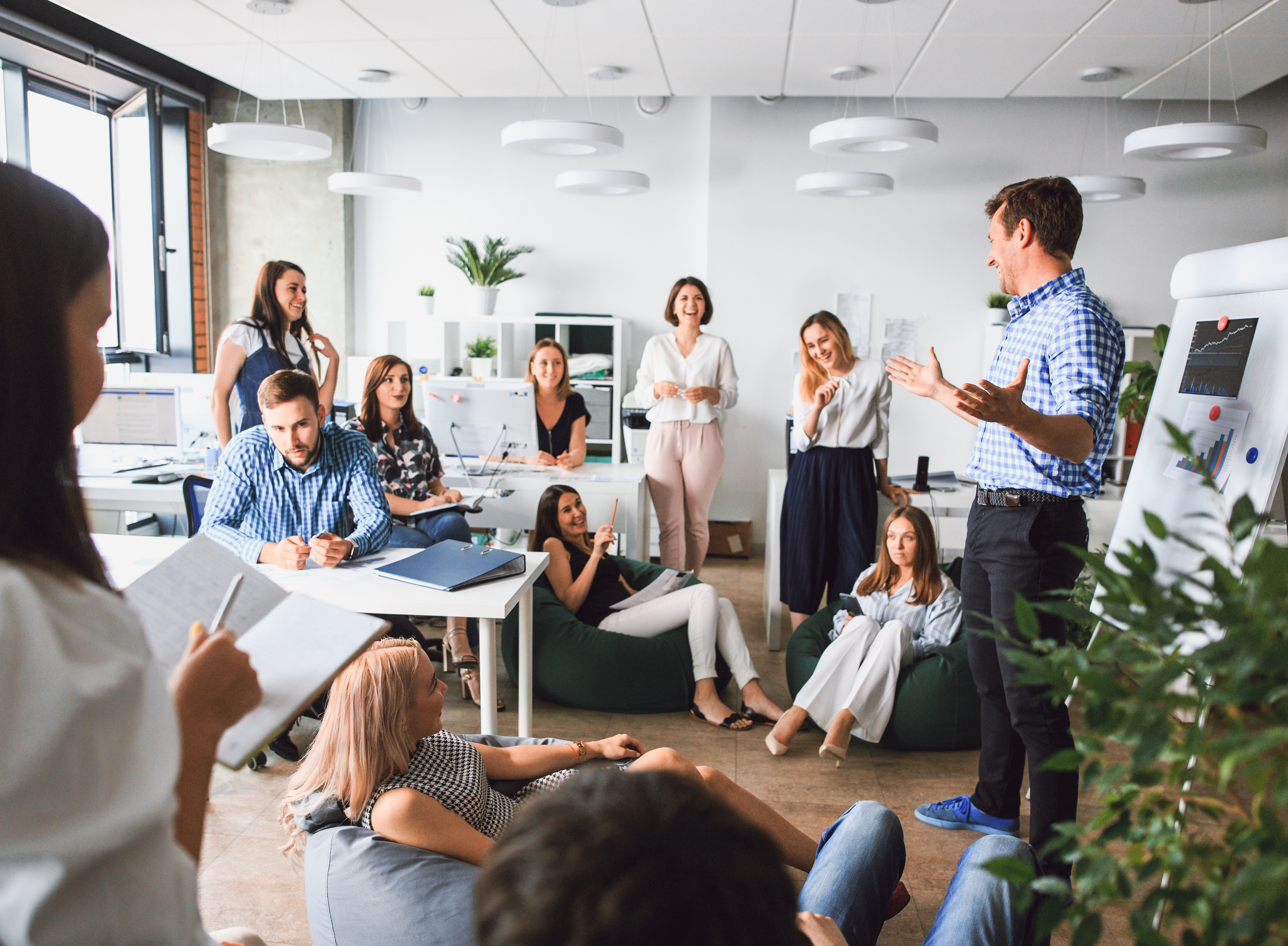 A creative working group works together on new innovative business models. Modern, open office space in a relaxed and upbeat atmosphere. ©canon5b