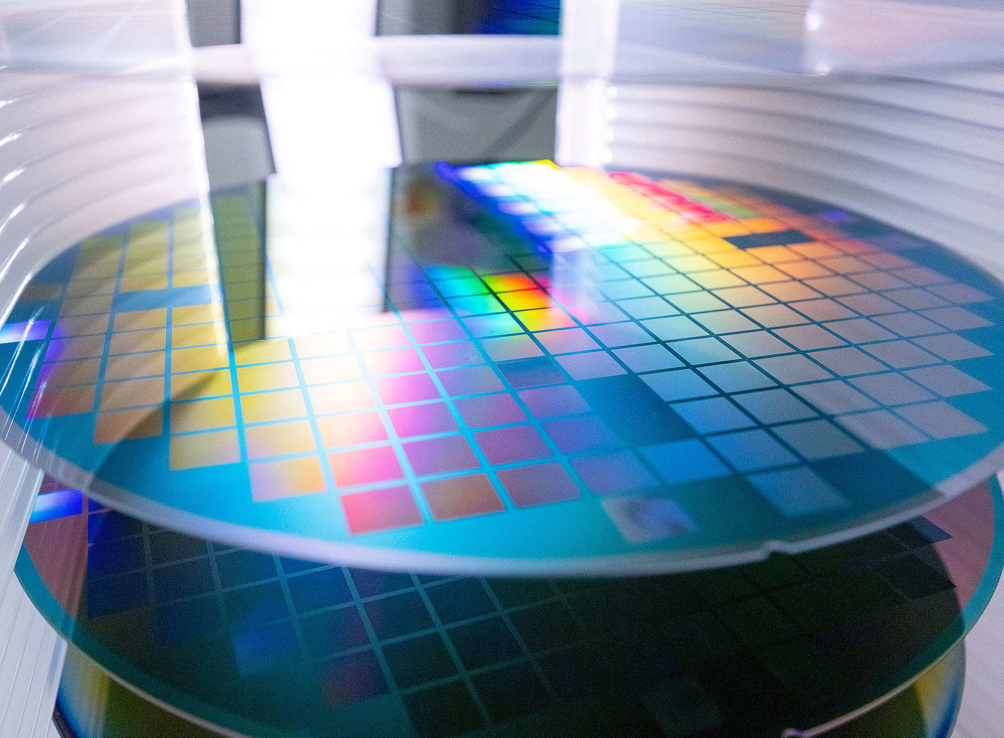 A close-up image of a semiconductor wafer with etched grids during the fabrication process ©TU Chemnitz Press Office