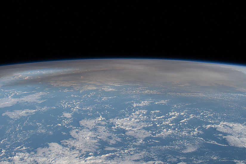 The atmospheric plume from the eruption of the underwater volcano Hunga in the Pacific nation of Tonga, pictured from the International Space Station ISS