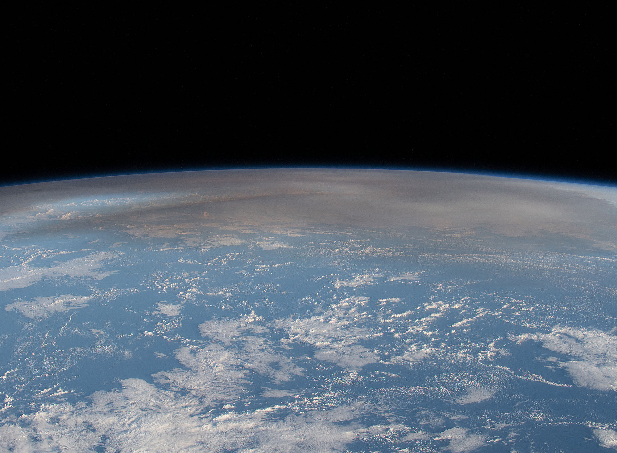 The atmospheric plume from the eruption of the underwater volcano Hunga in the Pacific nation of Tonga, pictured from the International Space Station ISS ©NASA/Kayla Barron, Public domain, Wikimedia Commons