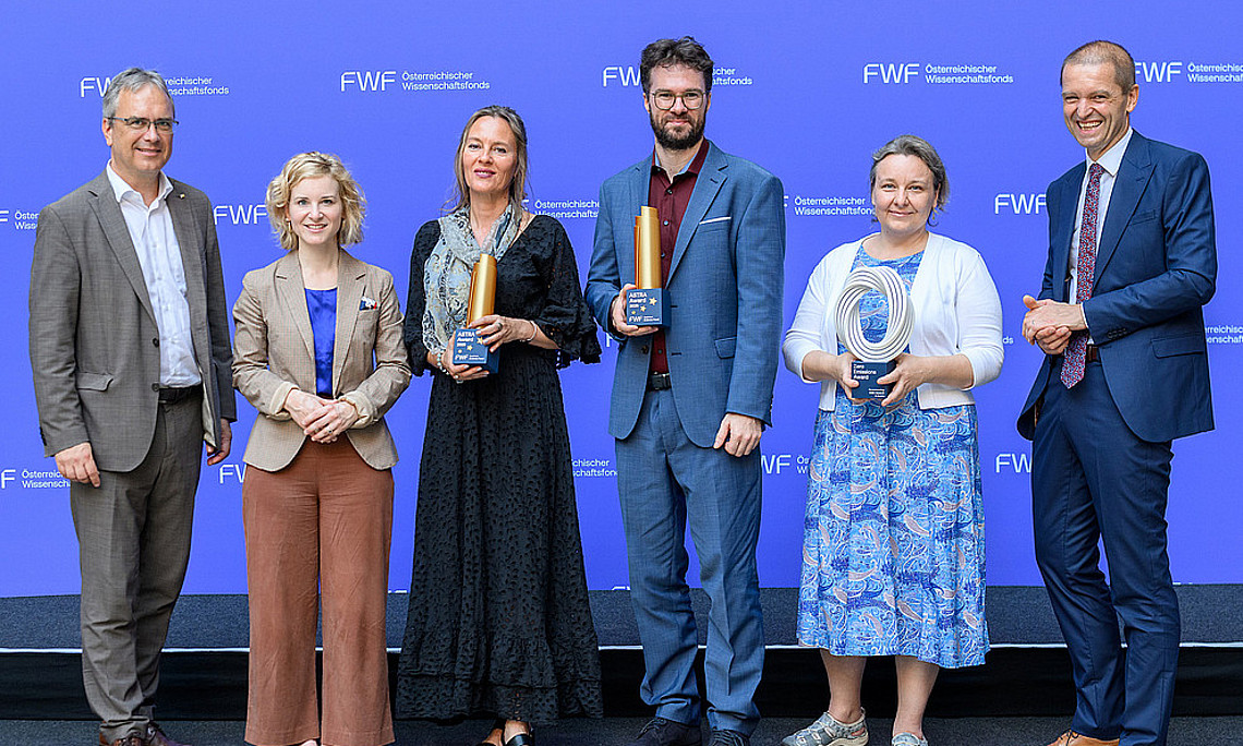 Preisträger mit Gratulanten