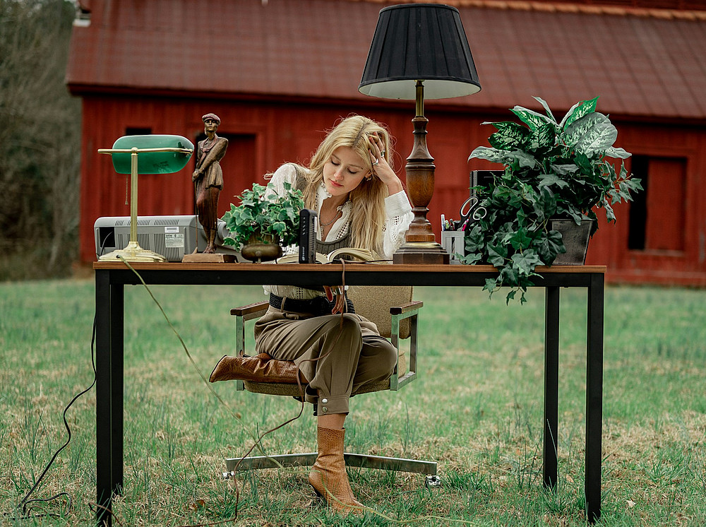 Woman at desk outdoors 