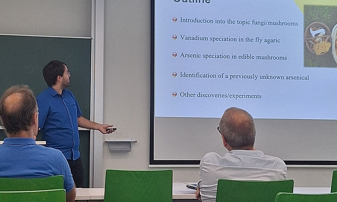 Martin during his defence showing the outline of his research