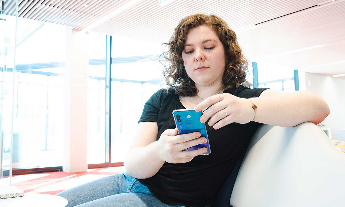 Student with smartphone
