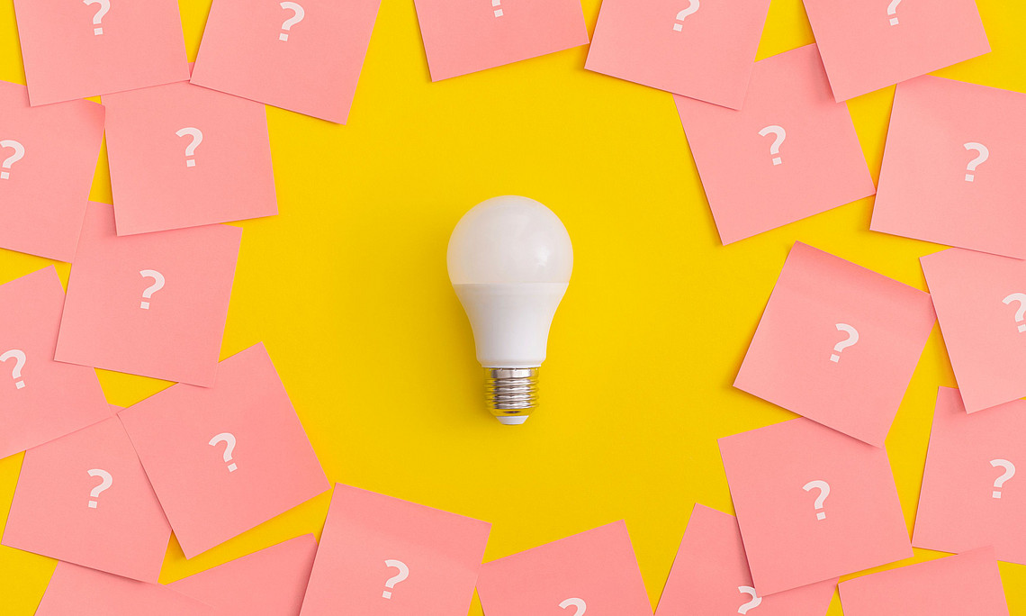 Light bulb on yellow background.