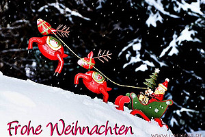 Weihnachtsmann mit Schlitten und Rentieren. Schriftzug: Frohe Weihnachten