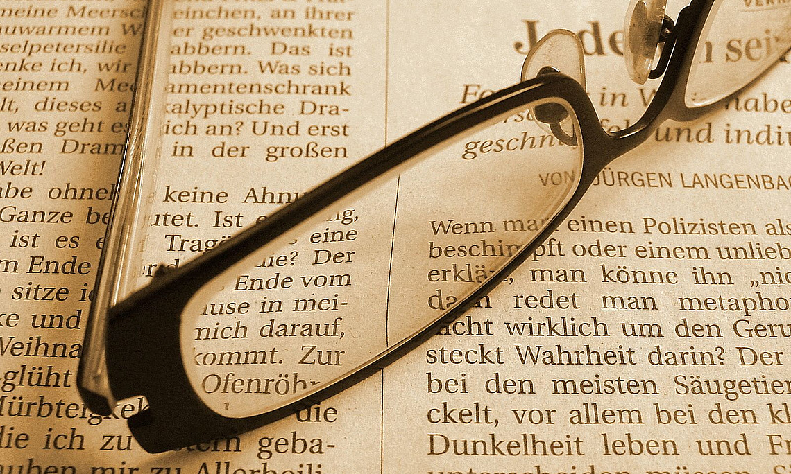 Zeitung, Lesebrille