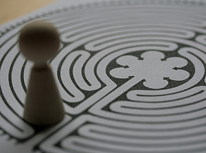 Toy Figure in Labyrinth 