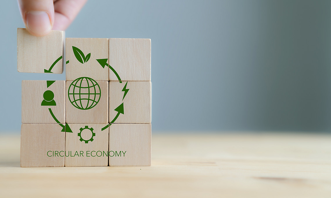 Circular Economy concept presented on wooden cubes