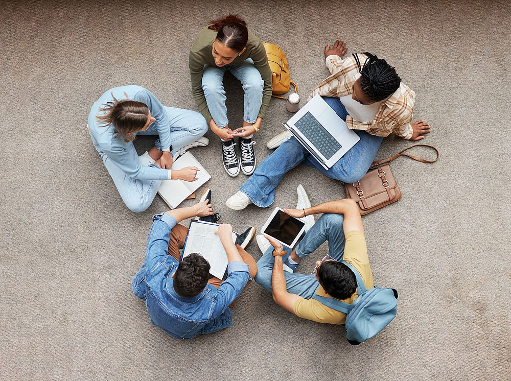 Bird's eye view of a working group of people ©Yuri Arcurs - stock.adobe.com