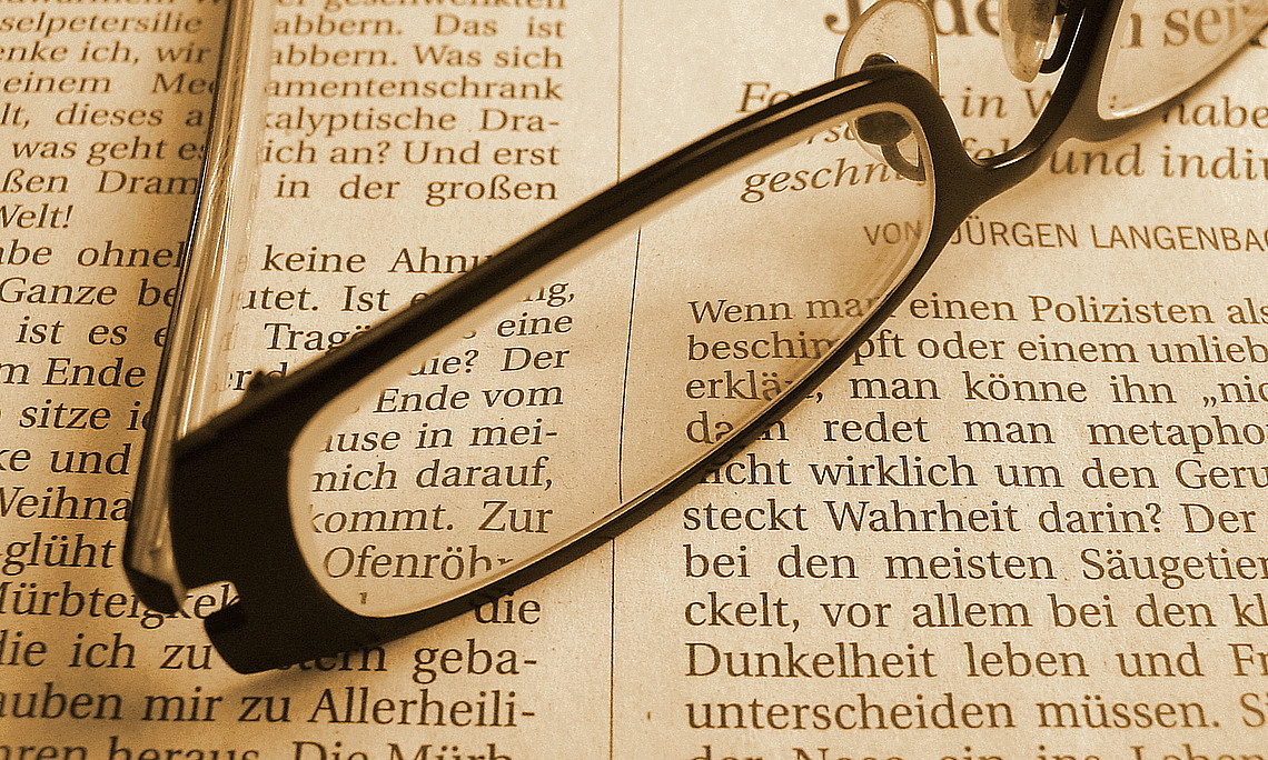 Zeitung, Lesebrille