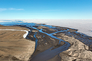 Aerial view of a glacier outflow on Flade Isblink