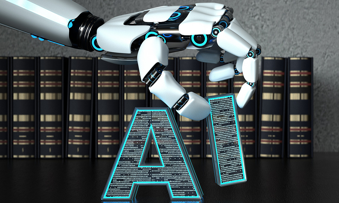 Das Wort "AI" wird vor Bücher gestellt