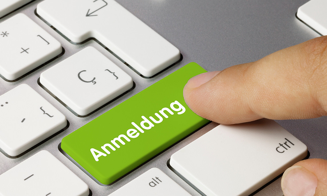 Symbolbild Anmeldung Tastatur mit grünem Anmeldungs-Button