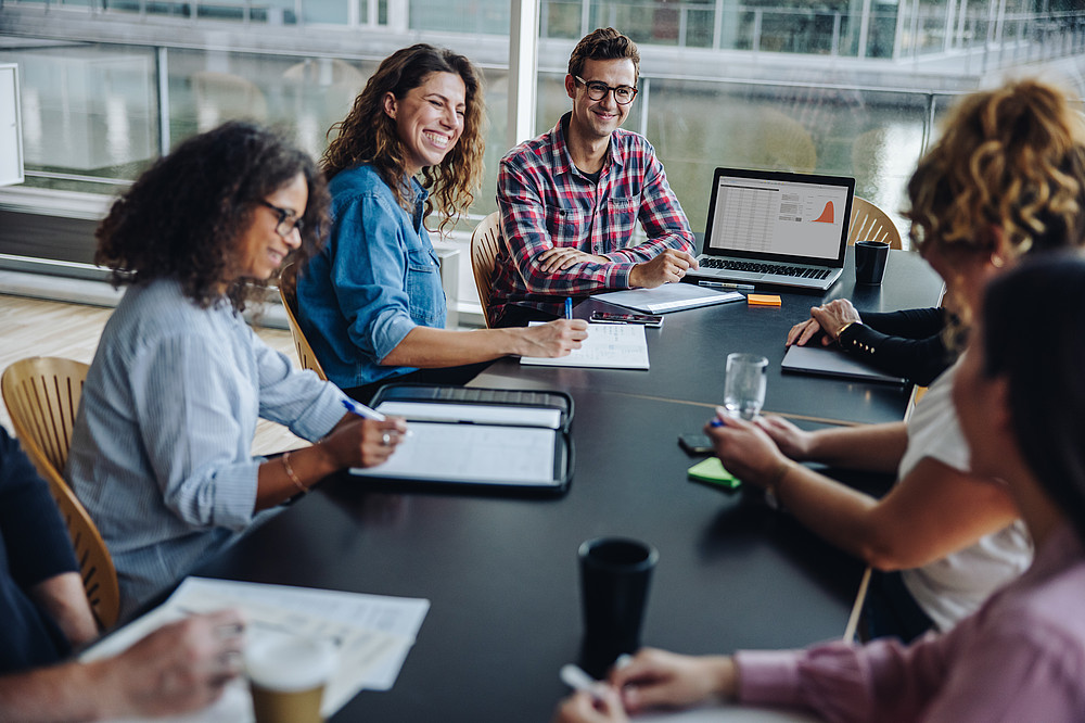Group meeting at one table ©Jacob Lund - stock.adobe.com