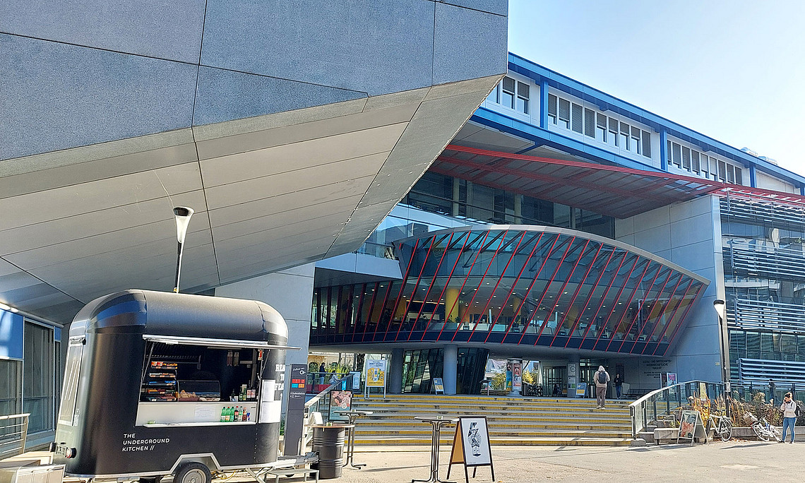 View of RESOWI, with the "Uni Bites" food truck in the foreground