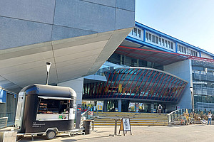 View of RESOWI, with the "Uni Bites" food truck in the foreground