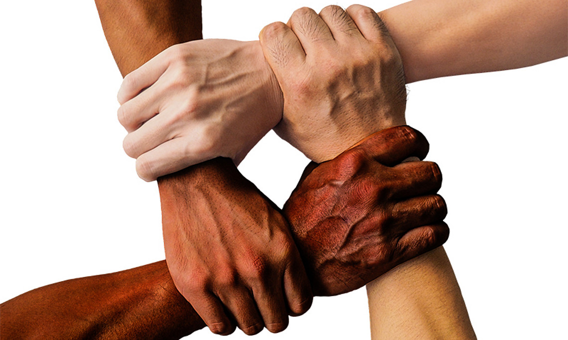 Putting hands together: Researchers at the University of Graz have investigated how the flow of refugees has fostered and challenged solidarity in civil society. Photo: Pixabay