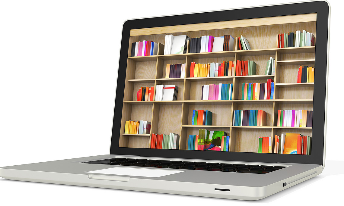 Laptop mit Bücherrücken