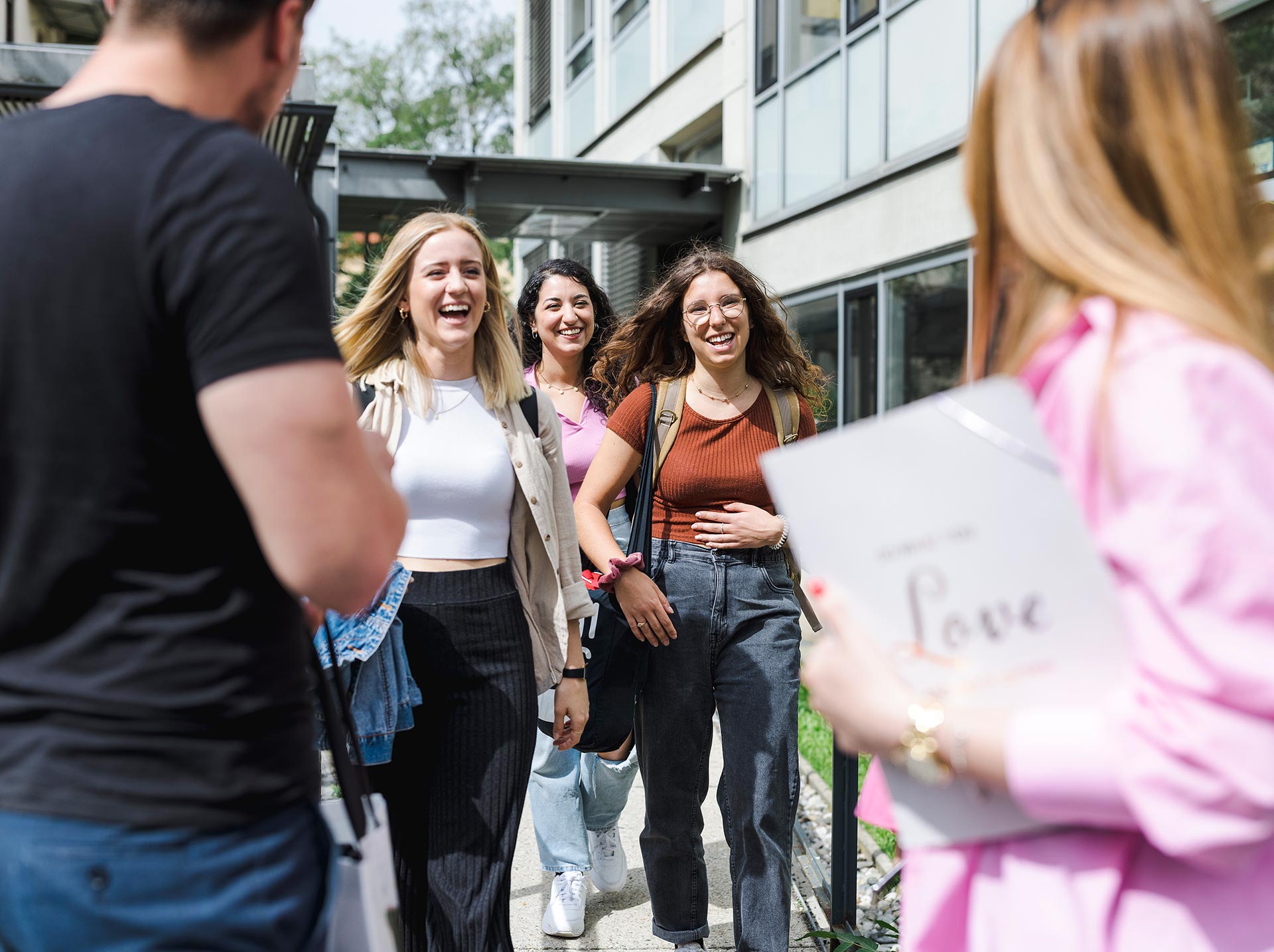 Students at the University of Graz, four women, one man 