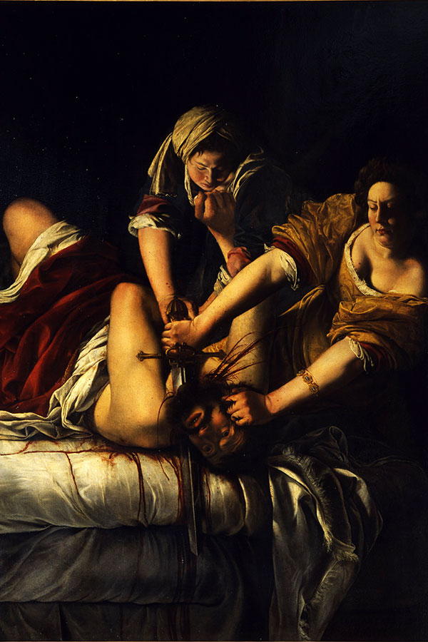 Judith enthauptet Holofernes, der sie zuvor gewaltvoll bedrängt hatte. Gemälde um 1620 von Artemisia Gentileschi, die mit diesem biblischen Motiv ihre eigene Vergewaltigung verarbeitete. Foto: wikimedia commons. 
